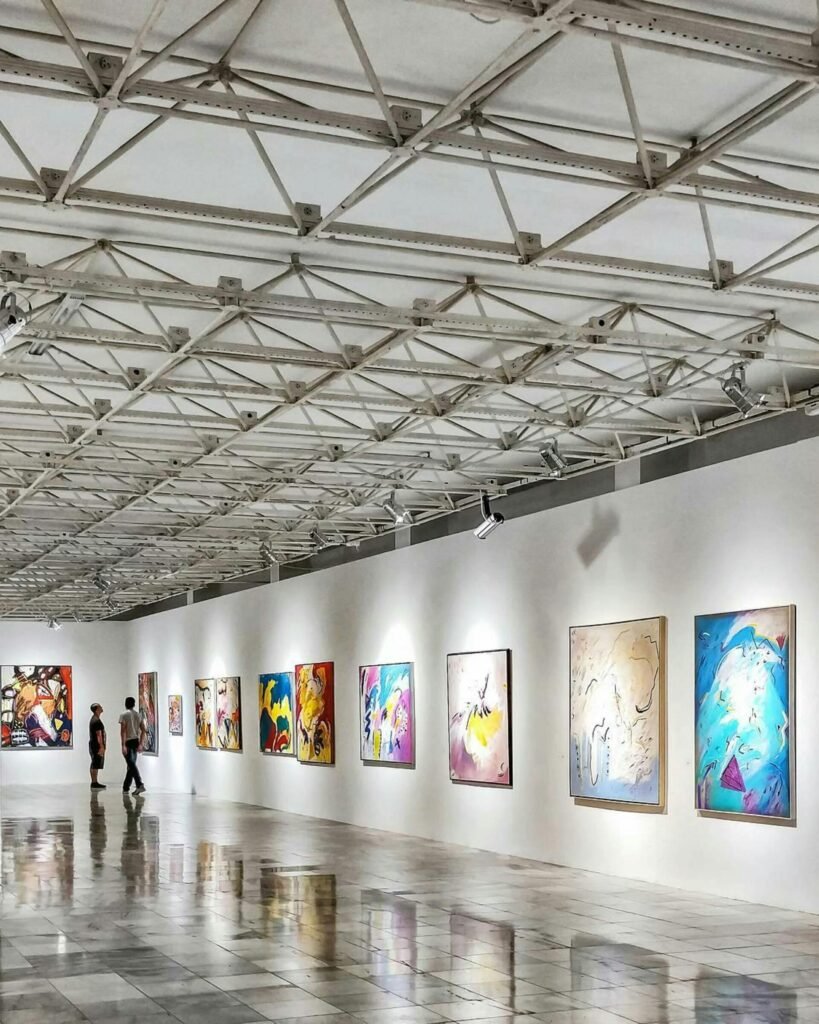 pexels-photo-2372978-2372978 Explore a contemporary art exhibition in an elegant Brazilian gallery with vivid paintings.